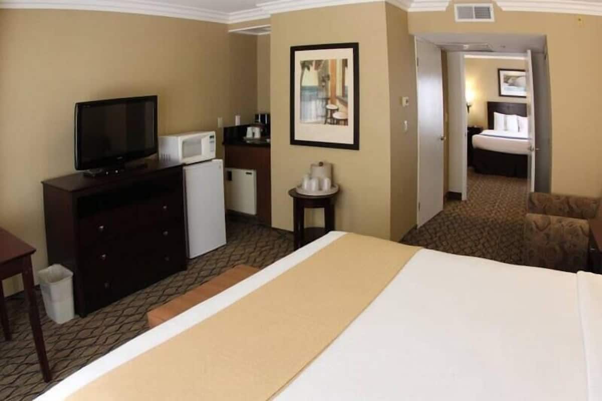 Premium Suite, Two Bedrooms with 1 King Bed and 1 Double Bed, Ocean View, Non Smoking | Premium bedding, in-room safe, desk, iron/ironing board