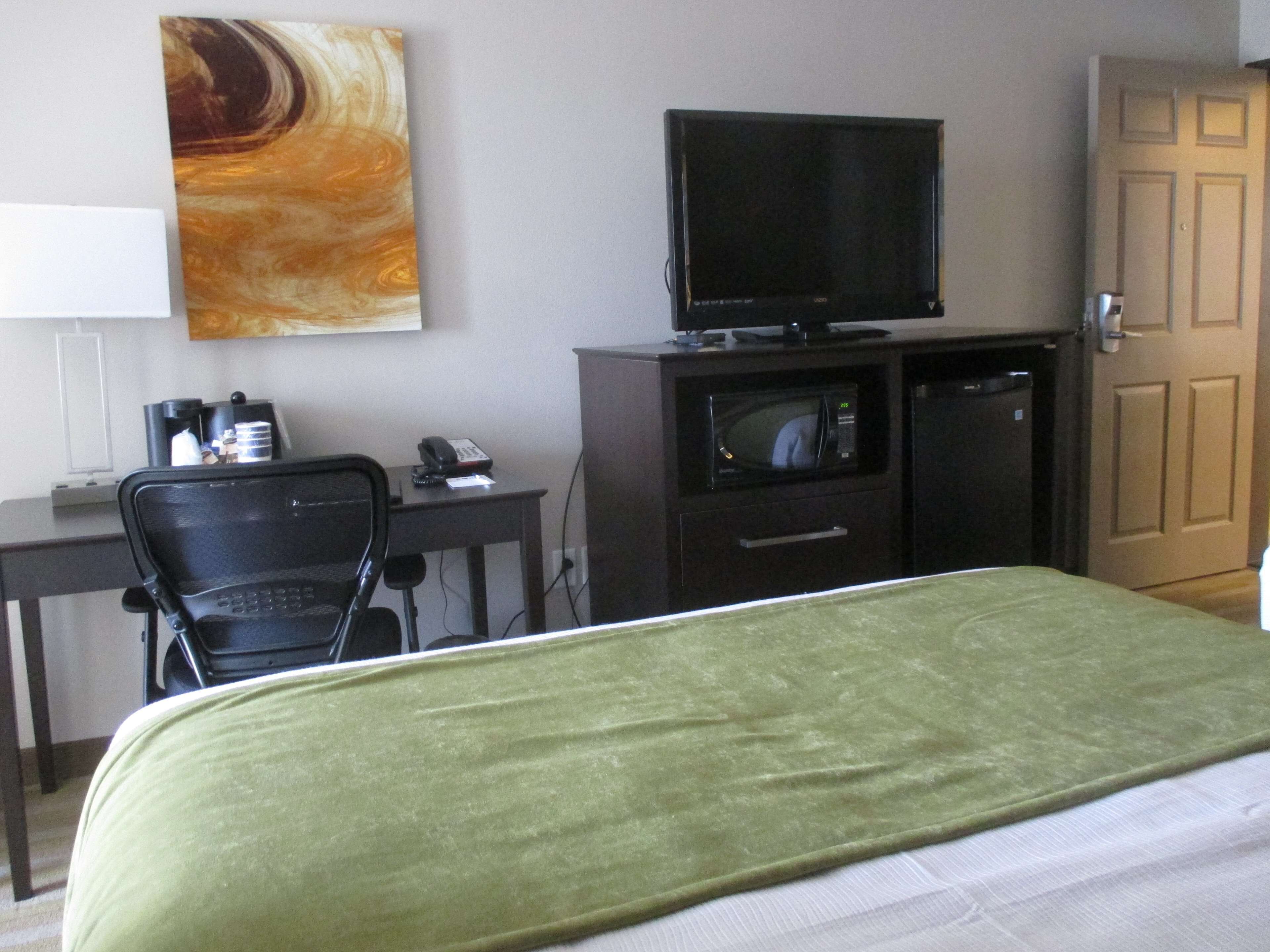 premium bedding, pillow-top beds, desk, blackout curtains