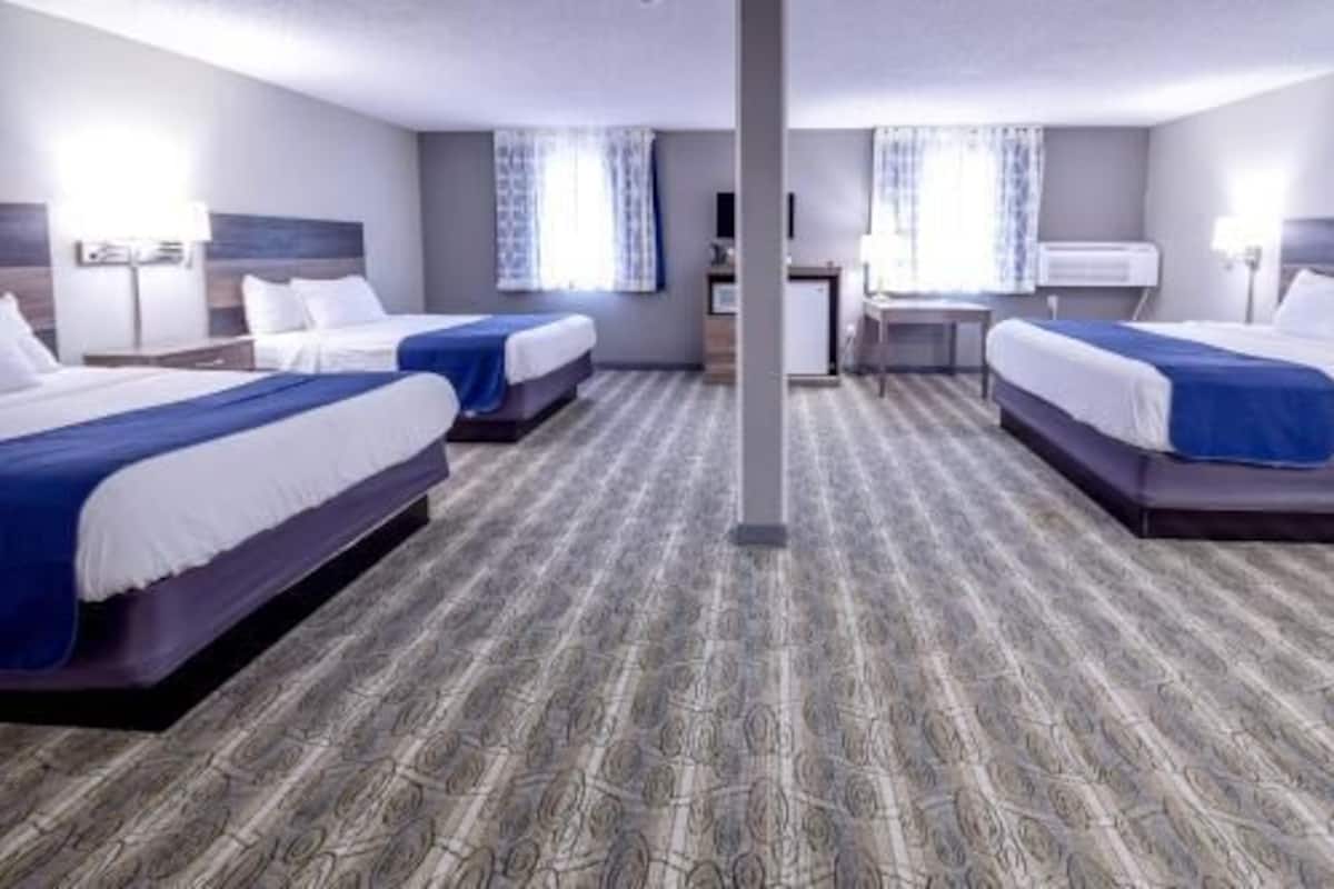 Premium bedding, blackout curtains, free cots/infant beds, free WiFi