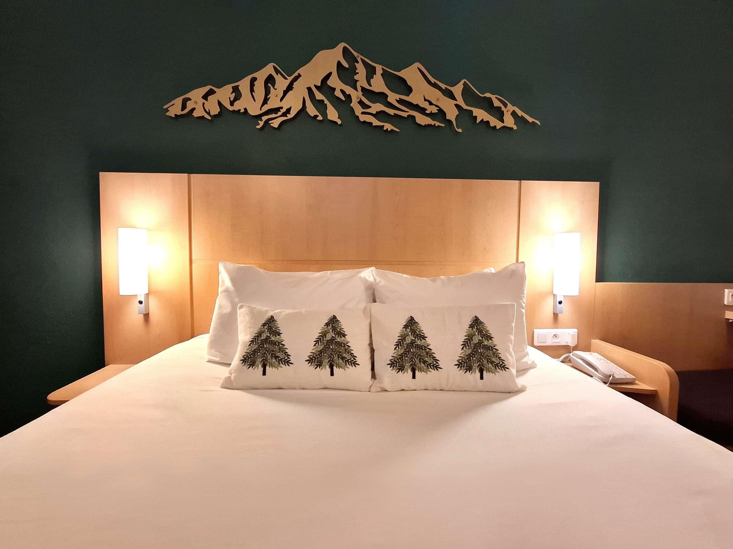 Premium bedding, desk, laptop workspace, blackout curtains