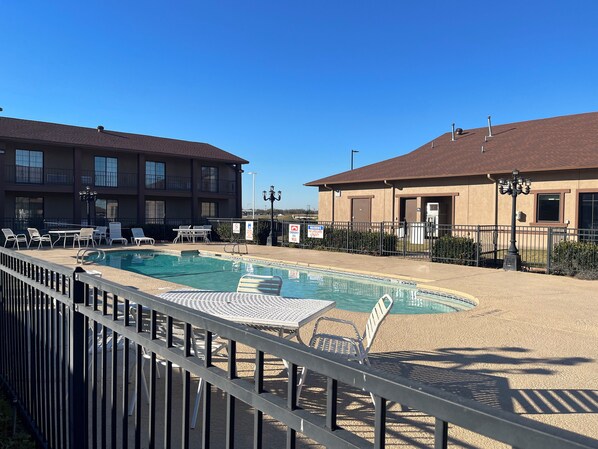 Seasonal outdoor pool, pool loungers