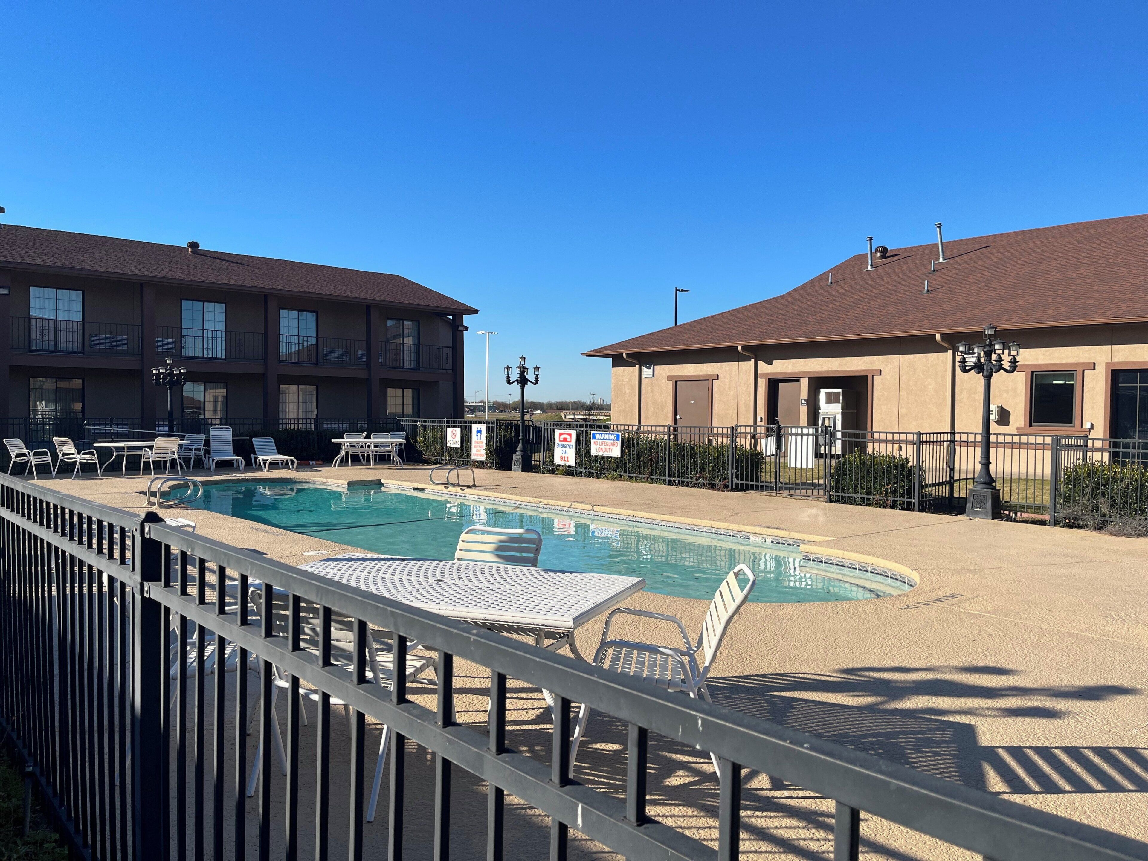 Seasonal outdoor pool, pool loungers