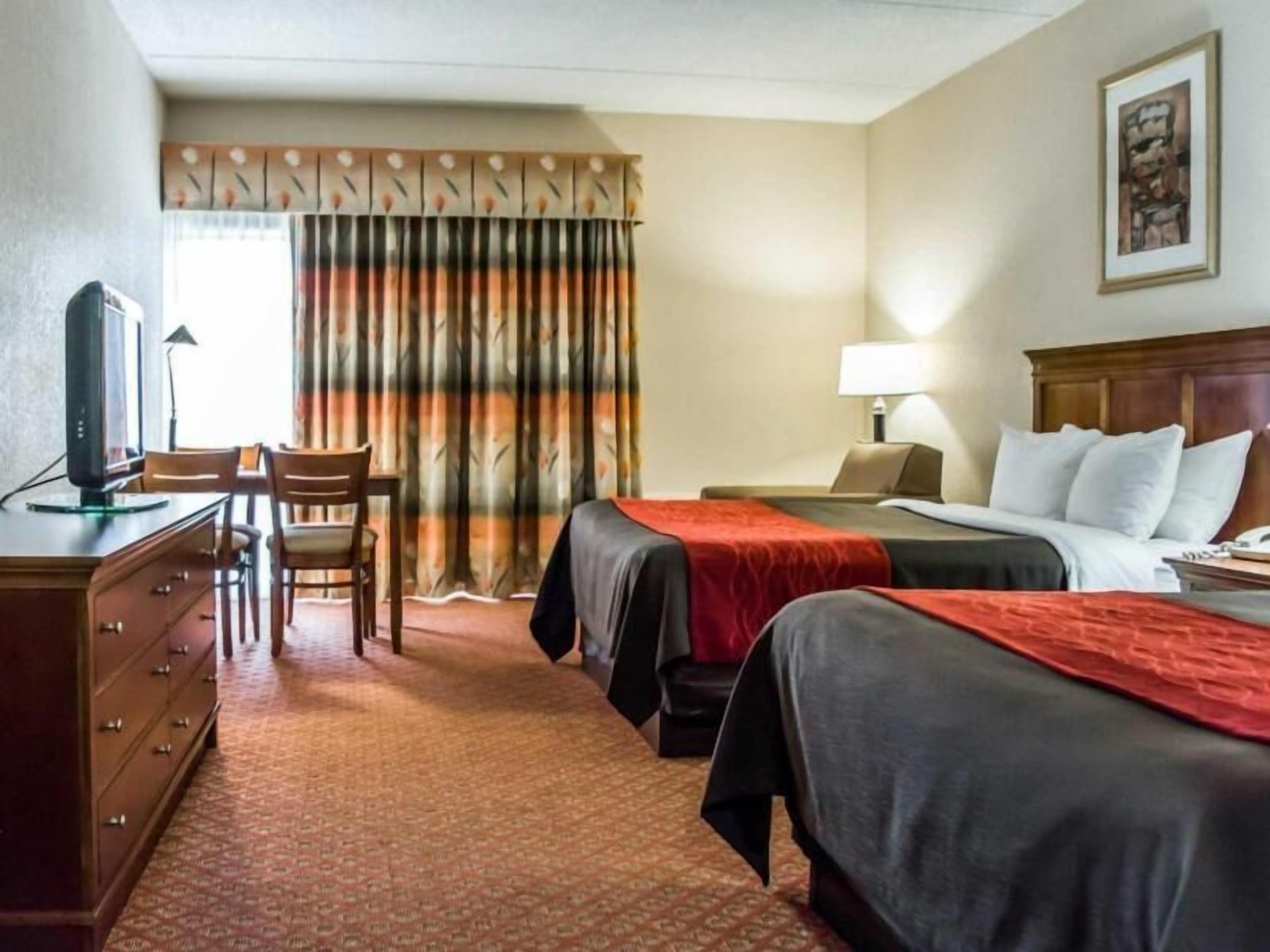 Desk, laptop workspace, iron/ironing board, rollaway beds