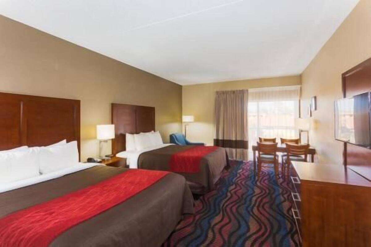 Desk, laptop workspace, iron/ironing board, rollaway beds