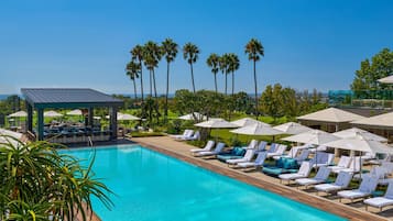 Outdoor pool, open 8:00 AM to 10:00 PM, cabanas (surcharge)