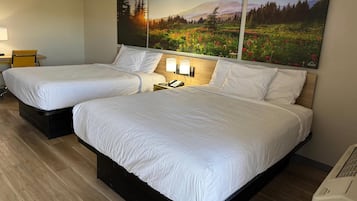 Premium bedding, individually furnished, desk, laptop workspace