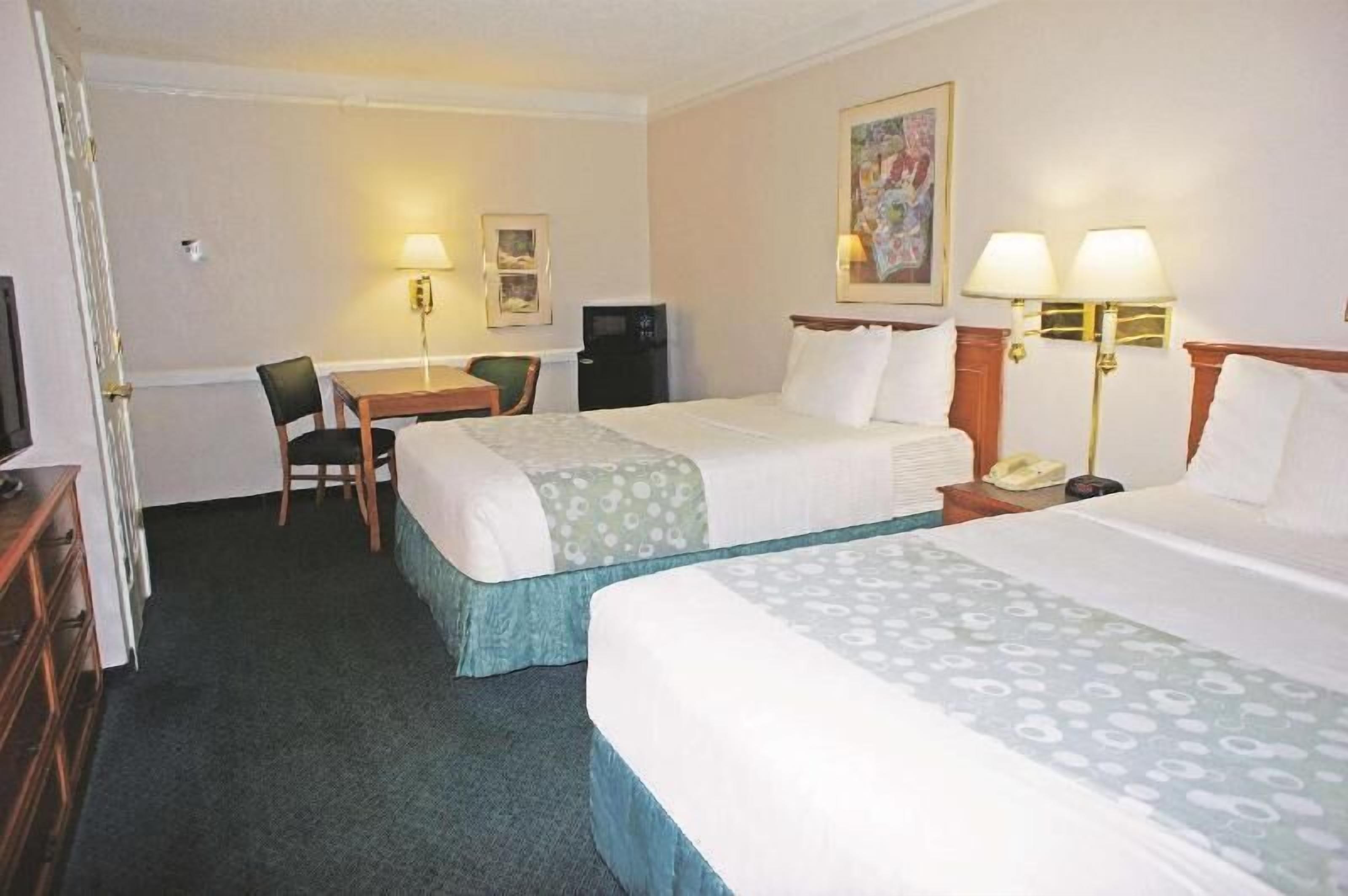 Premium bedding, individually furnished, desk, laptop workspace