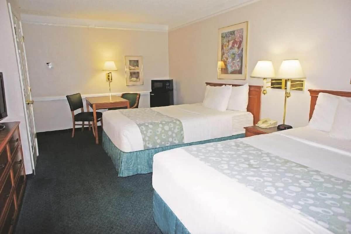 Premium bedding, individually furnished, desk, laptop workspace