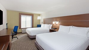 A hotel room with two beds, a desk, a chair, a lamp, and a window. - Holiday Inn Express West Los Angeles by IHG (Los Angeles)
