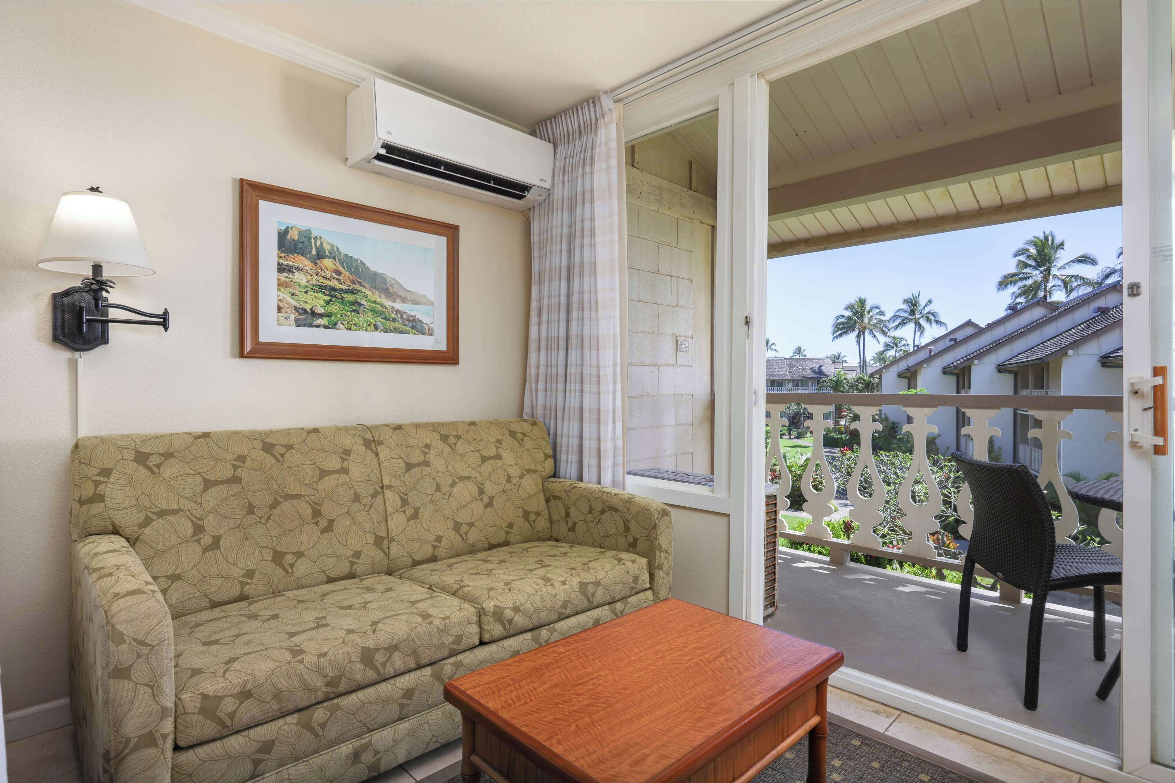 Habitación, vista al océano | Área de sala de estar