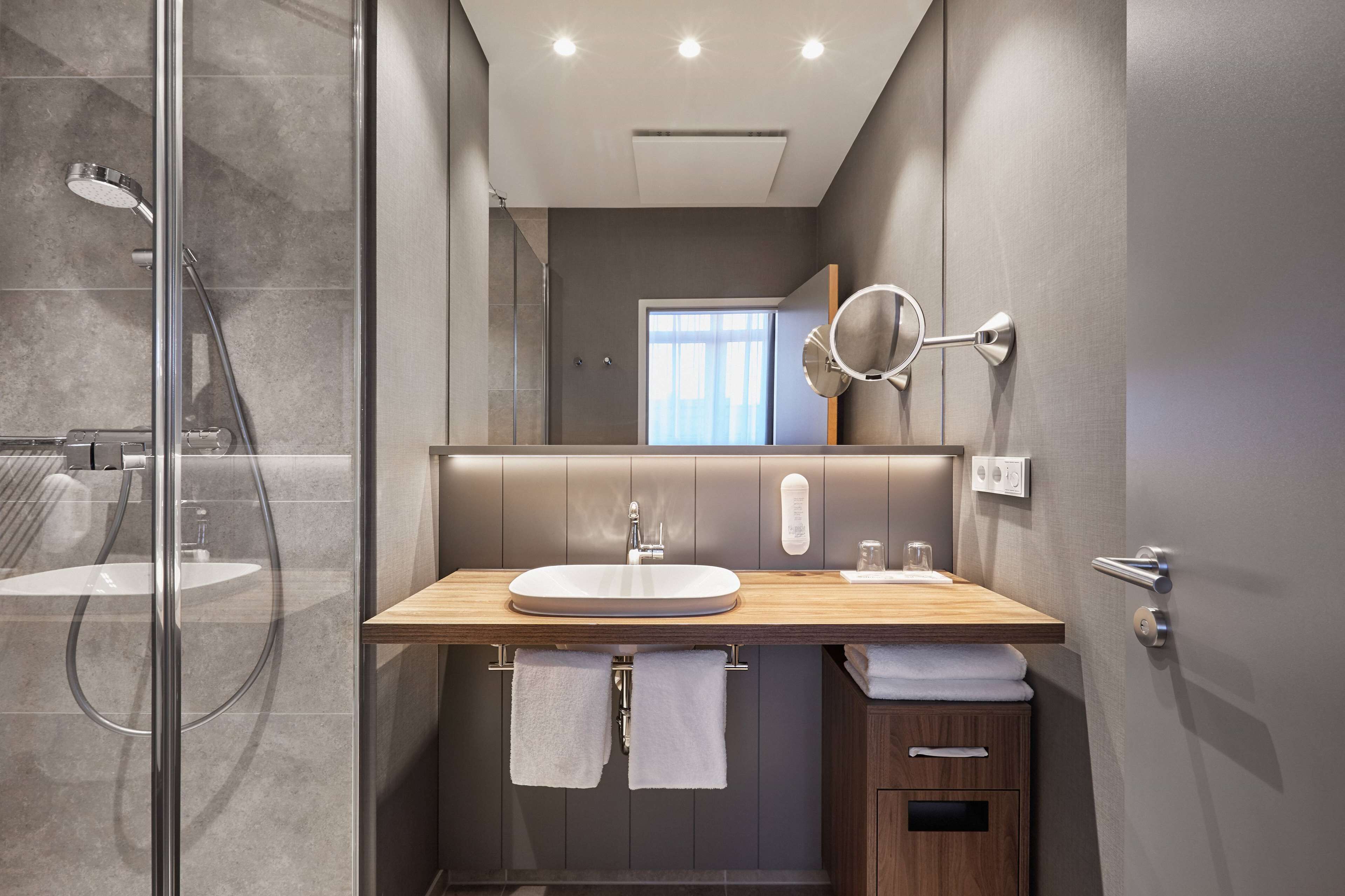 comfort double room, 1 king bed | bathroom | shower, eco-friendly toiletries, hair dryer, towels