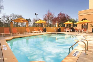 Seasonal outdoor pool, open 9:00 AM to 10 PM, pool umbrellas