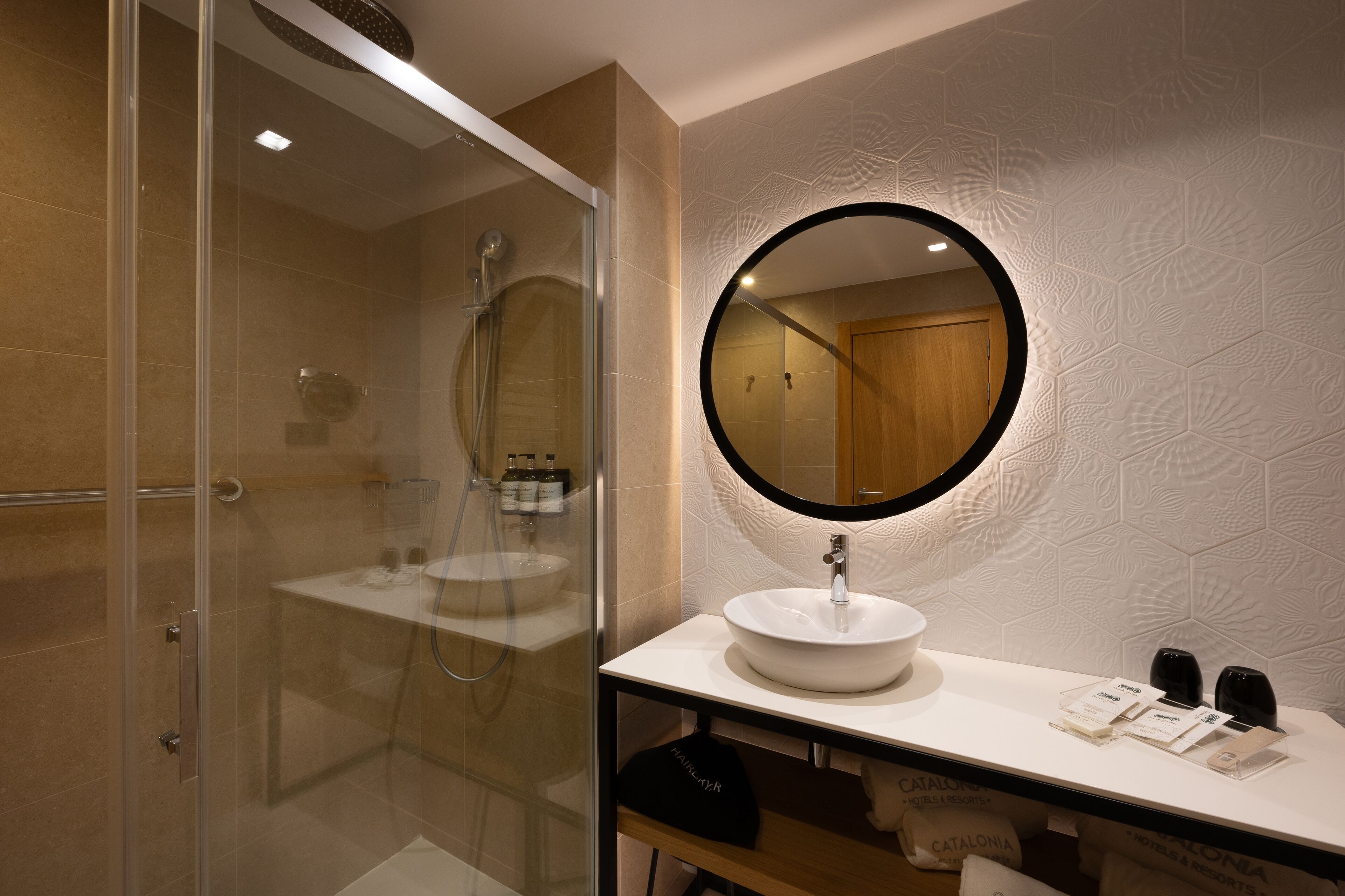 bathtub, eco-friendly toiletries, hair dryer, towels