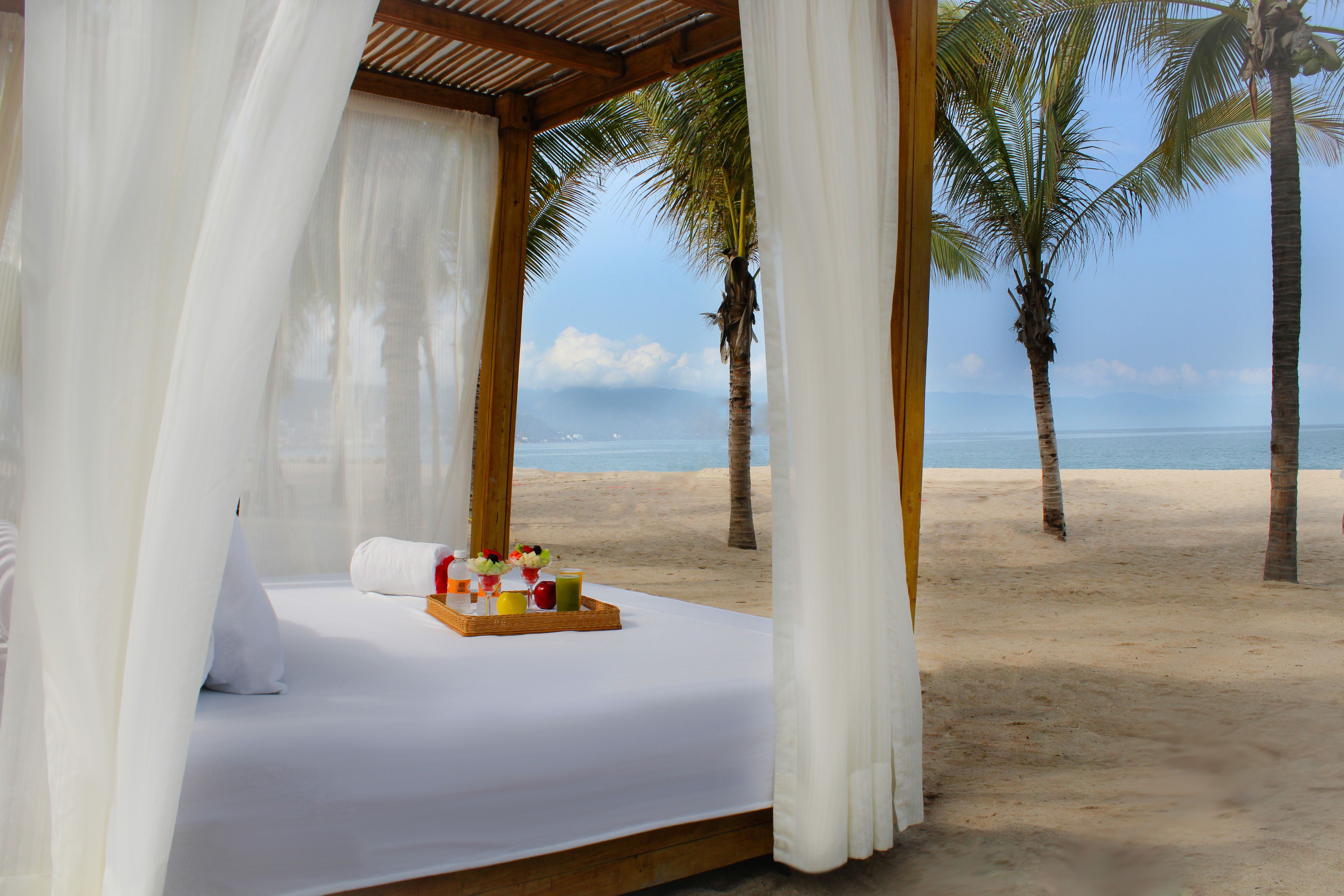 On the beach, sun loungers, beach umbrellas, beach towels