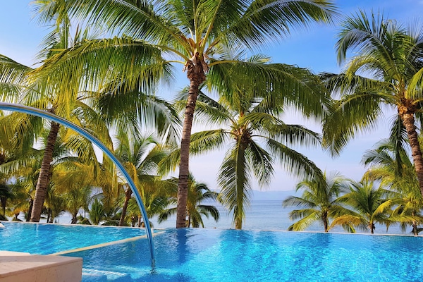 Outdoor pool, cabanas (surcharge), pool umbrellas