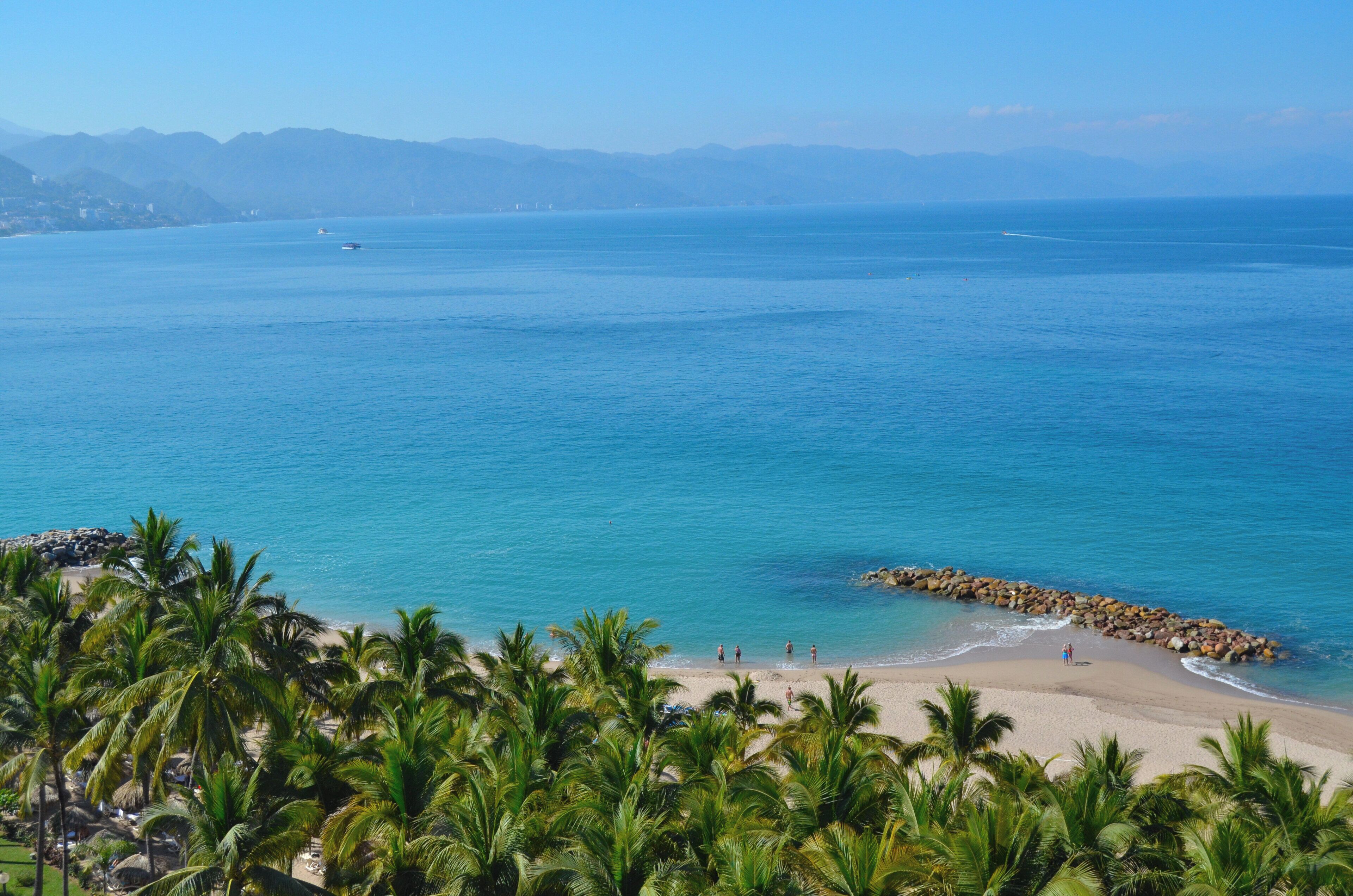 On the beach, sun loungers, beach umbrellas, beach towels