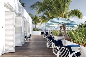 Outdoor pool, open 6:00 AM to 8:00 PM, cabanas (surcharge)