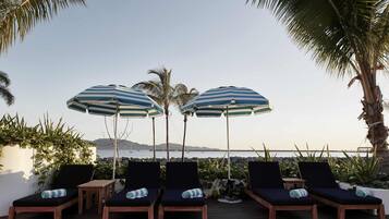 Outdoor pool, open 7:00 AM to 7:00 PM, cabanas (surcharge)