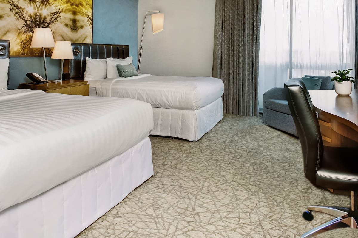 Deluxe Two Queen | Premium bedding, in-room safe, desk, iron/ironing board