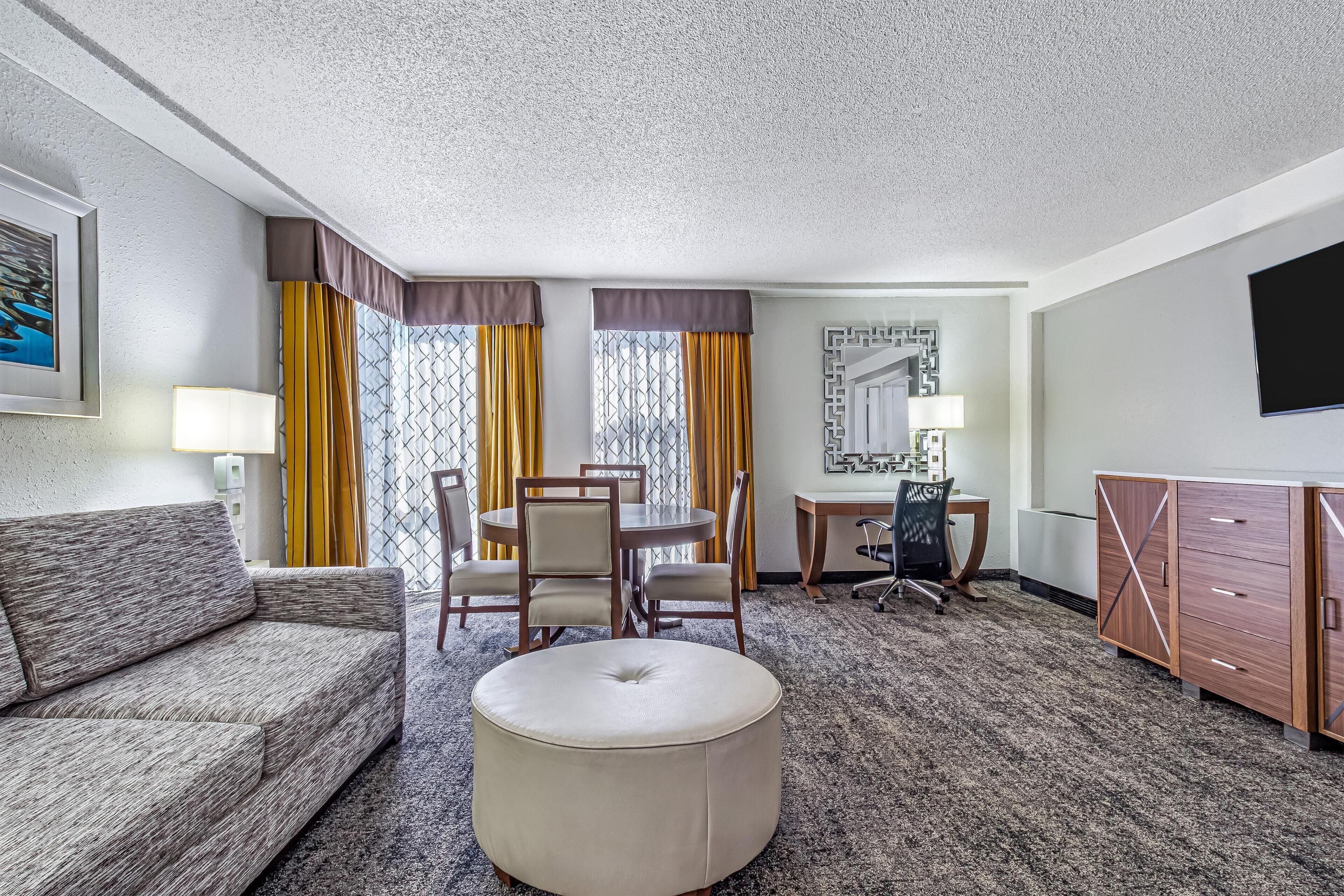 Executive Suite, 1 King Bed with Sofa bed, Non Smoking | Living area | 50-inch LCD TV with digital channels, TV