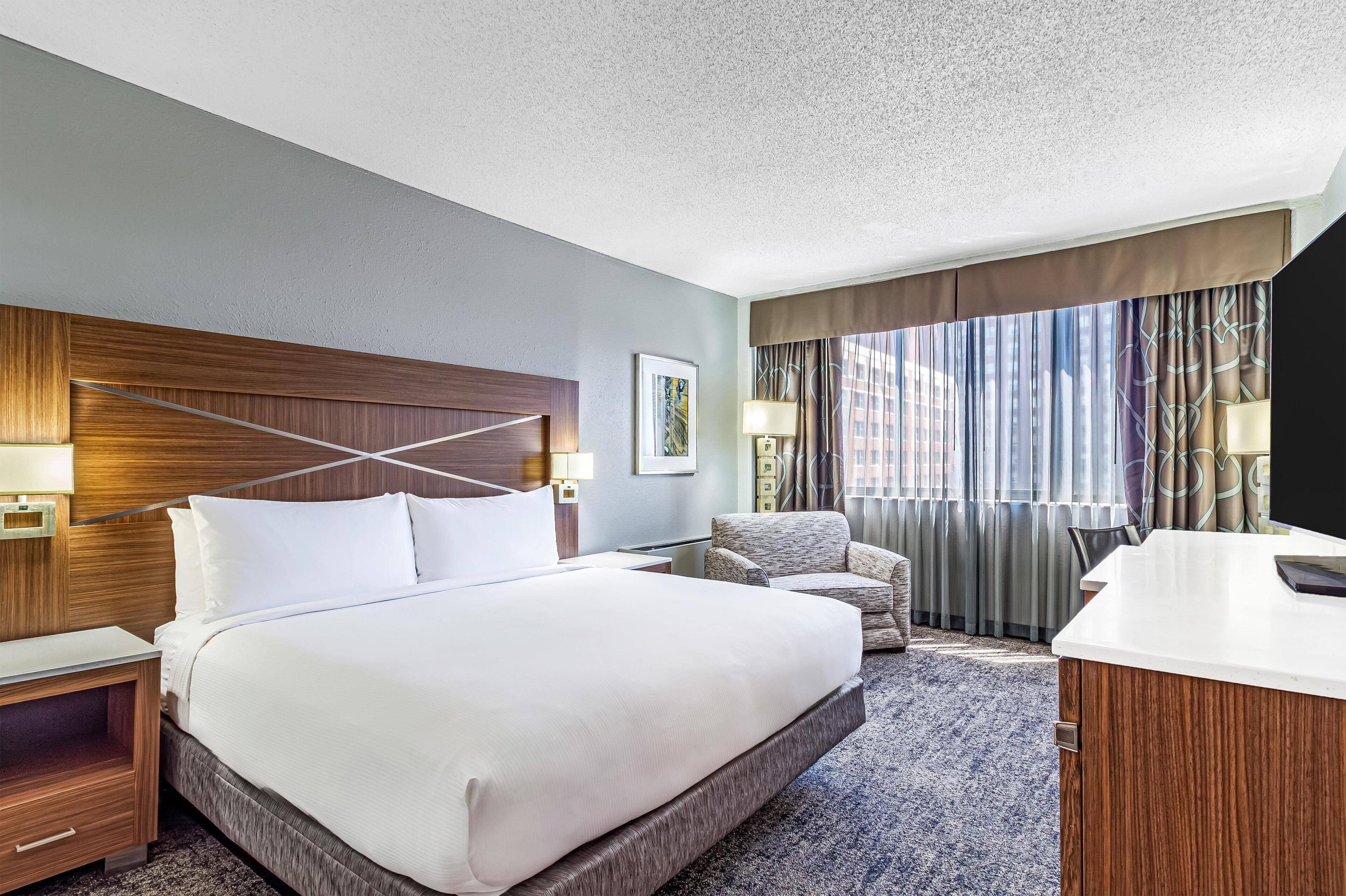Premium bedding, down duvets, pillow-top beds, in-room safe