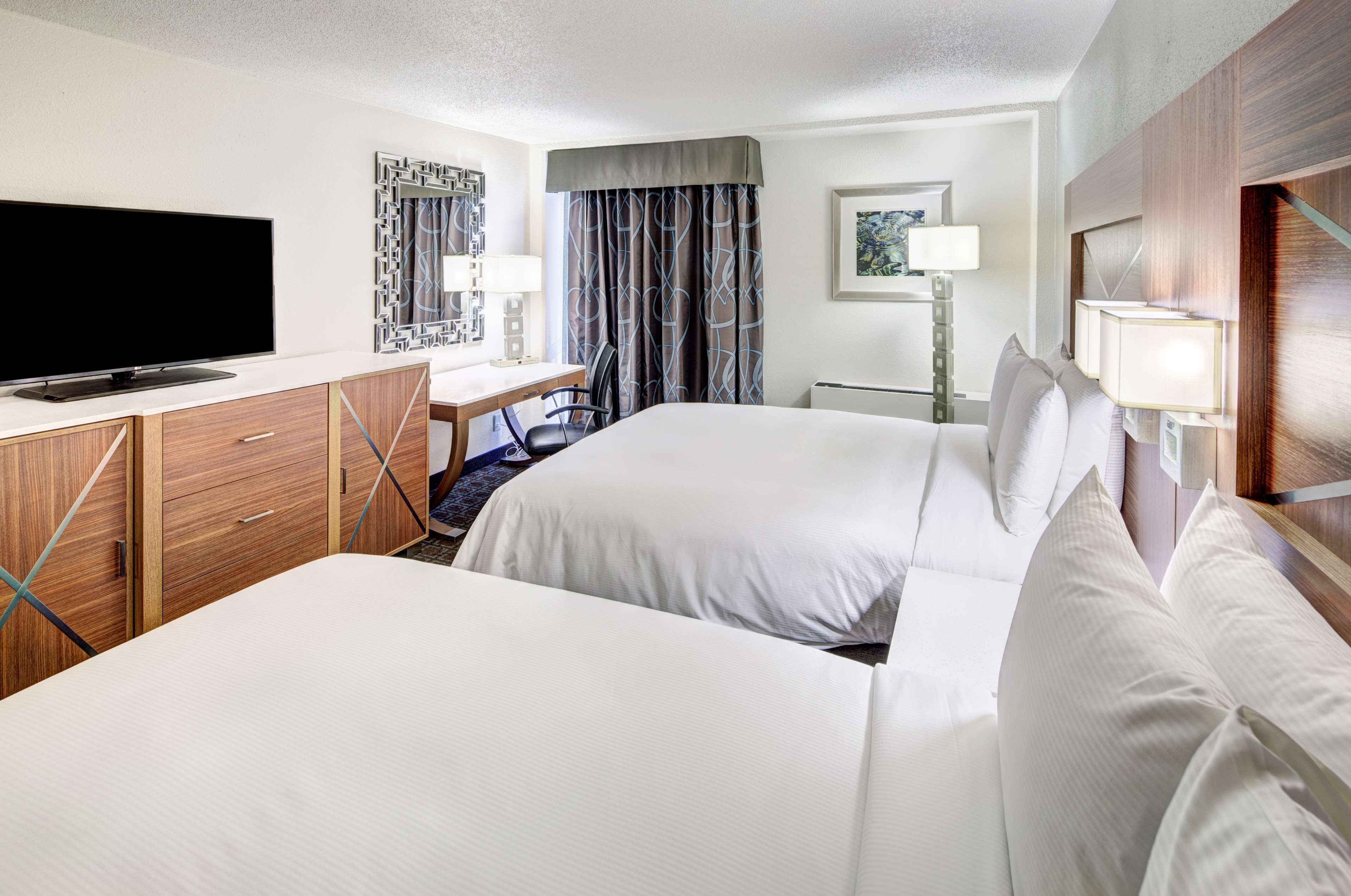 premium room, 2 queen beds, non smoking, refrigerator & microwave | premium bedding, down duvets, pillow-top beds, in-room safe