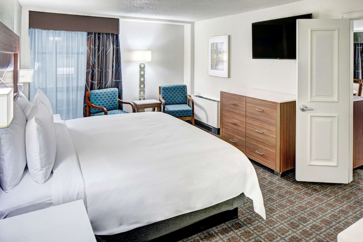 Suite, 1 King Bed, Non Smoking | Premium bedding, down comforters, pillowtop beds, in-room safe