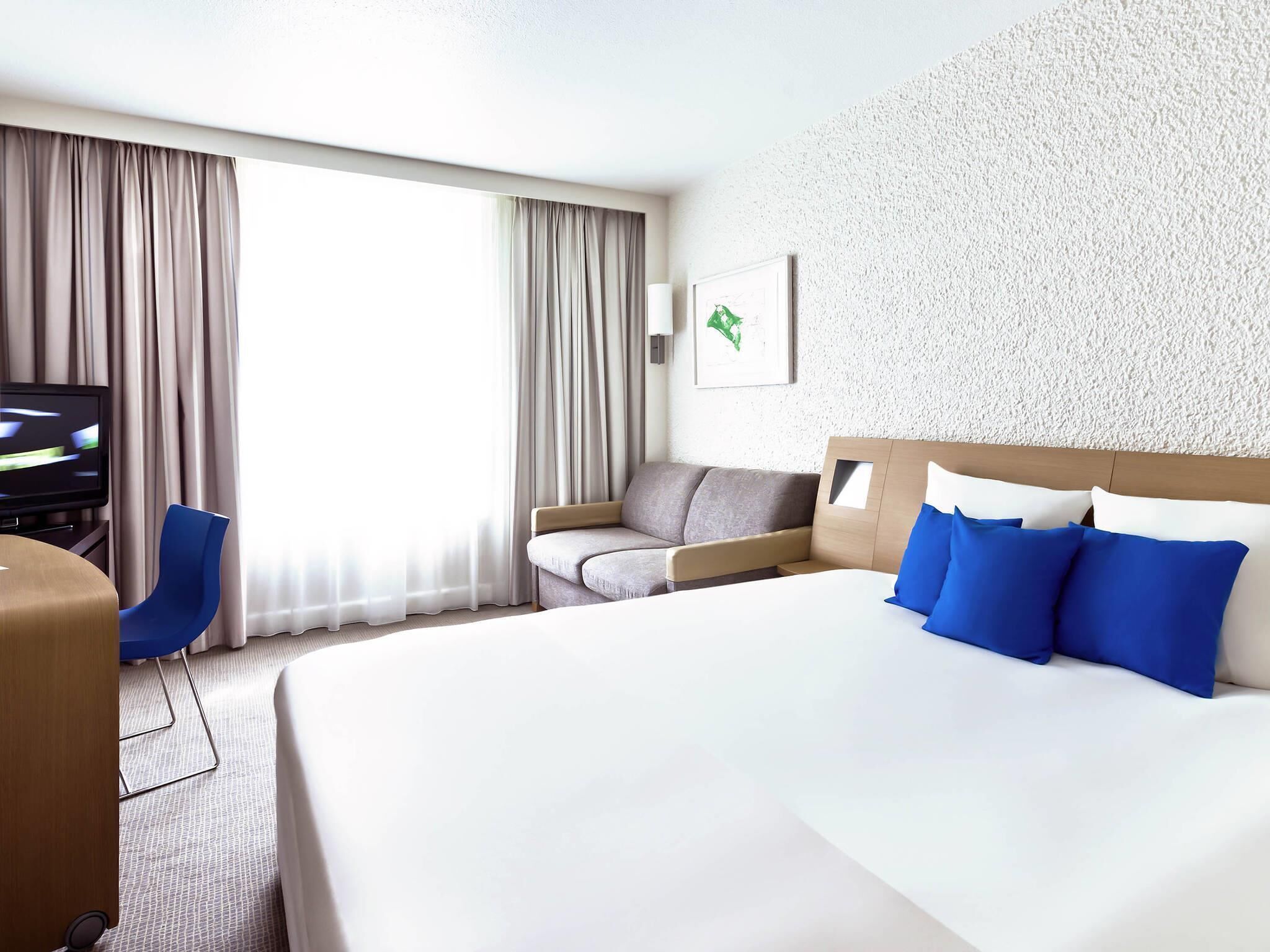 Premium bedding, memory-foam beds, in-room safe, blackout curtains