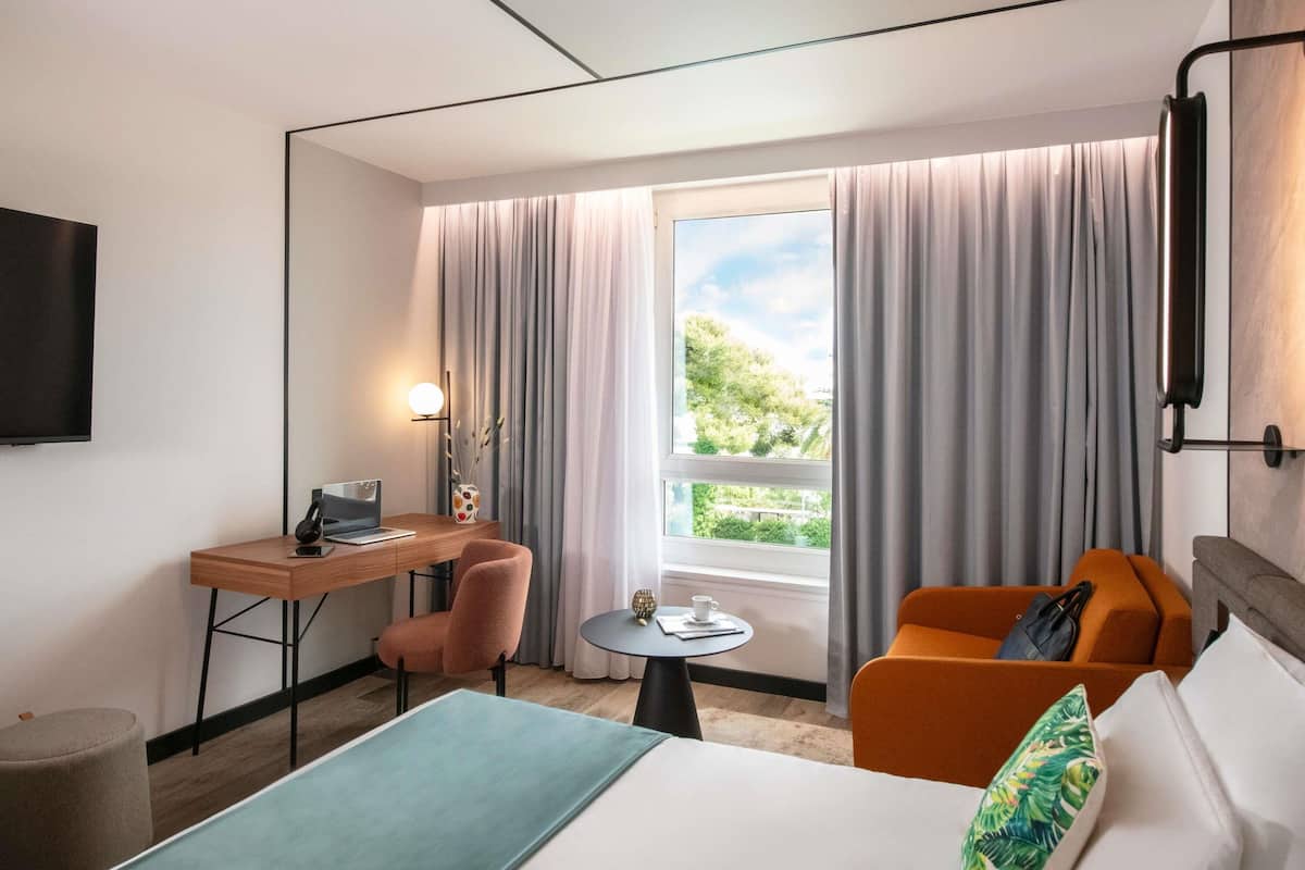 executive room, 1 king bed with sofa bed, garden view | premium bedding, memory-foam beds, in-room safe, blackout curtains