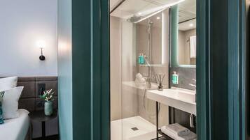 Premium bedding, memory-foam beds, in-room safe, blackout curtains