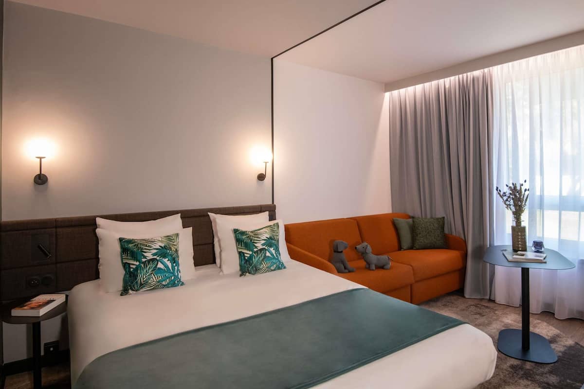 Premium bedding, memory foam beds, in-room safe, blackout drapes