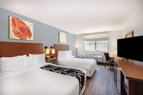 Ropa de cama de alta calidad, colchones con pillow-top y escritorio