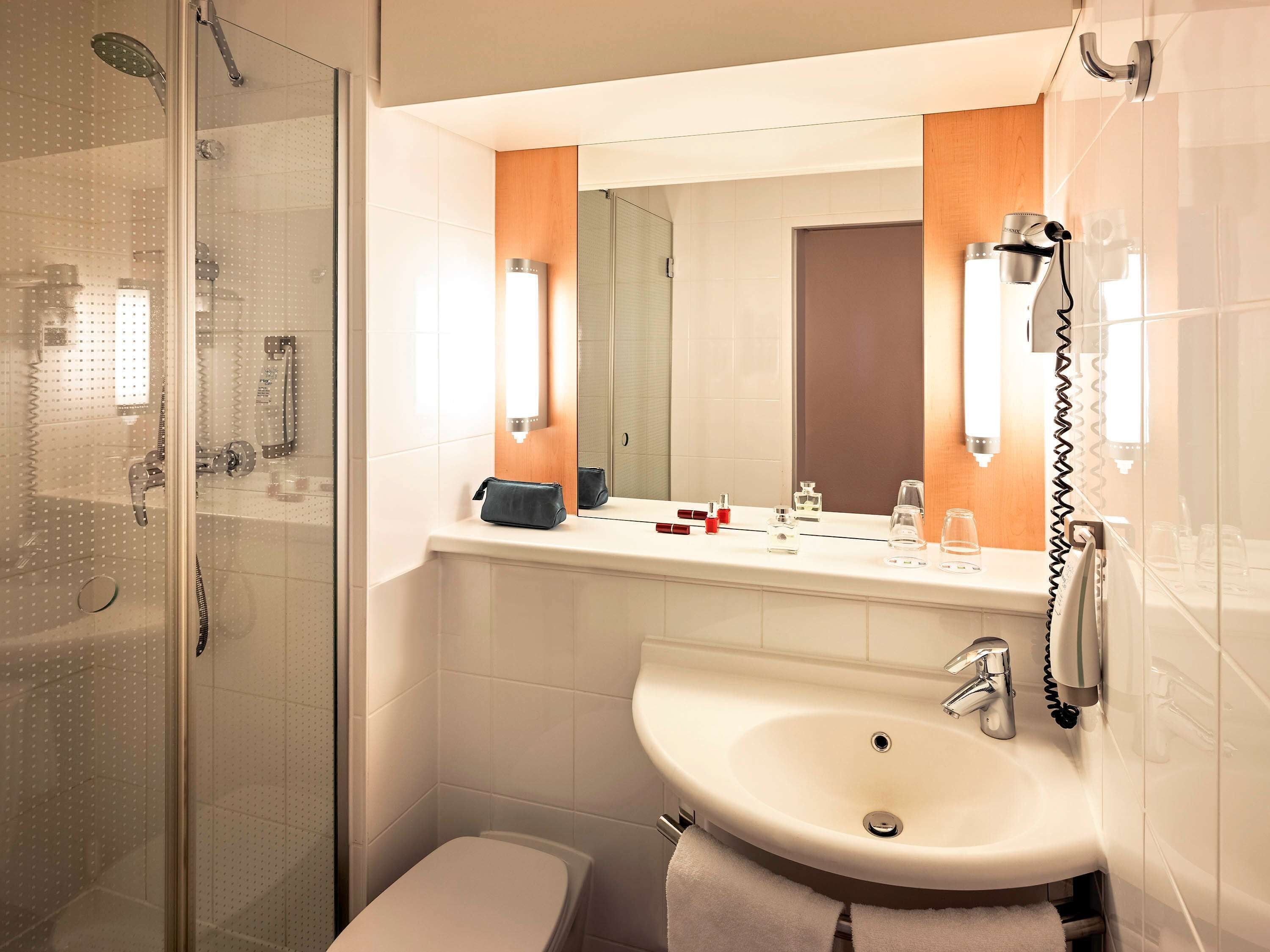 premium bedding, pillow-top beds, desk, laptop workspace