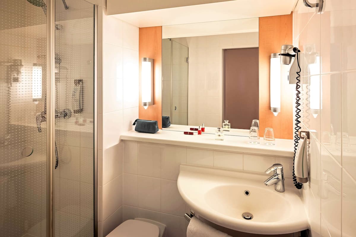 premium bedding, pillow-top beds, desk, laptop workspace