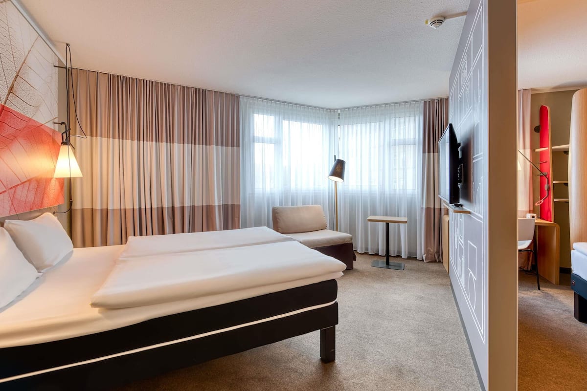 premium bedding, pillow-top beds, desk, laptop workspace