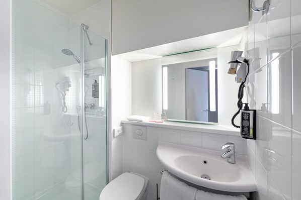 Shower, eco-friendly toiletries, hair dryer, towels