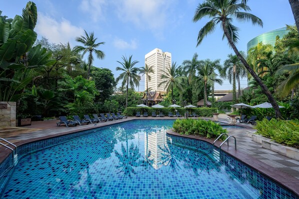 Outdoor pool, open 6:00 AM to 8:00 PM, pool umbrellas, pool loungers