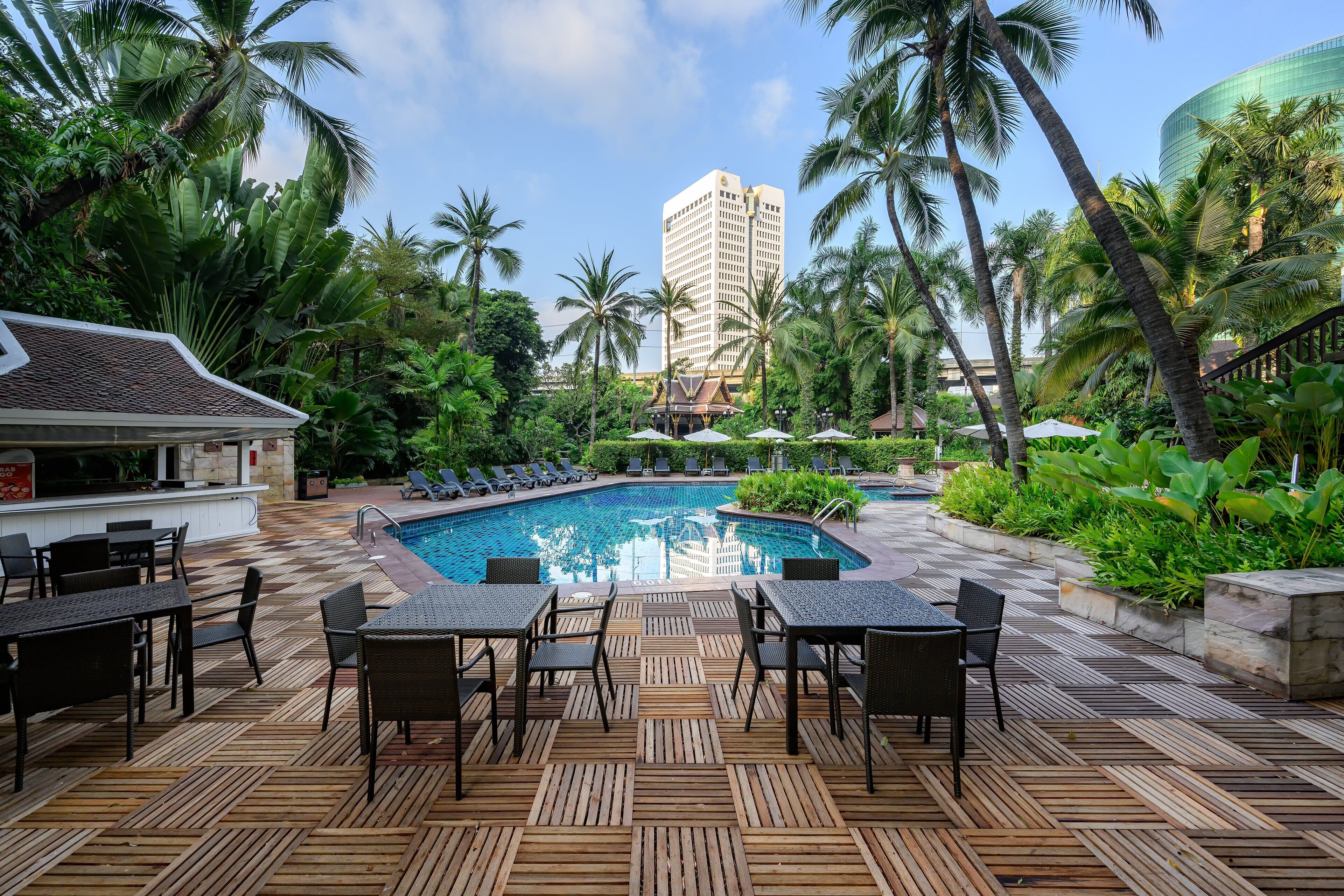 Outdoor pool, open 6:00 AM to 8:00 PM, pool umbrellas, pool loungers