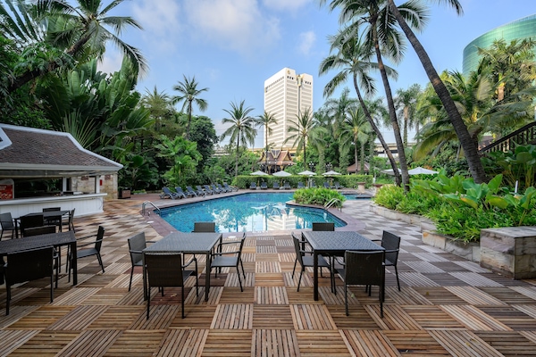 Outdoor pool, open 6:00 AM to 8:00 PM, pool umbrellas, pool loungers