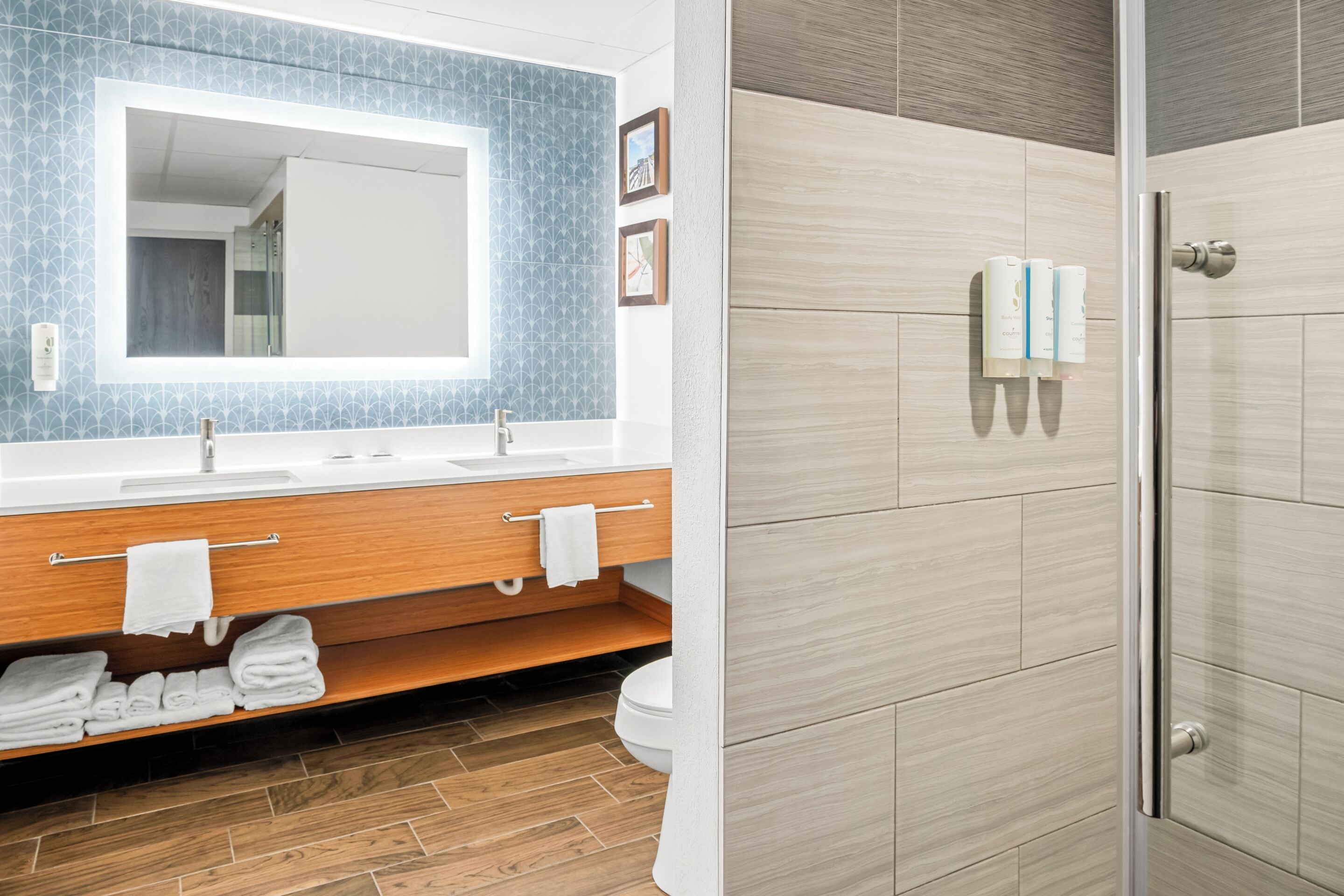 Designer toiletries, hair dryer, towels, soap