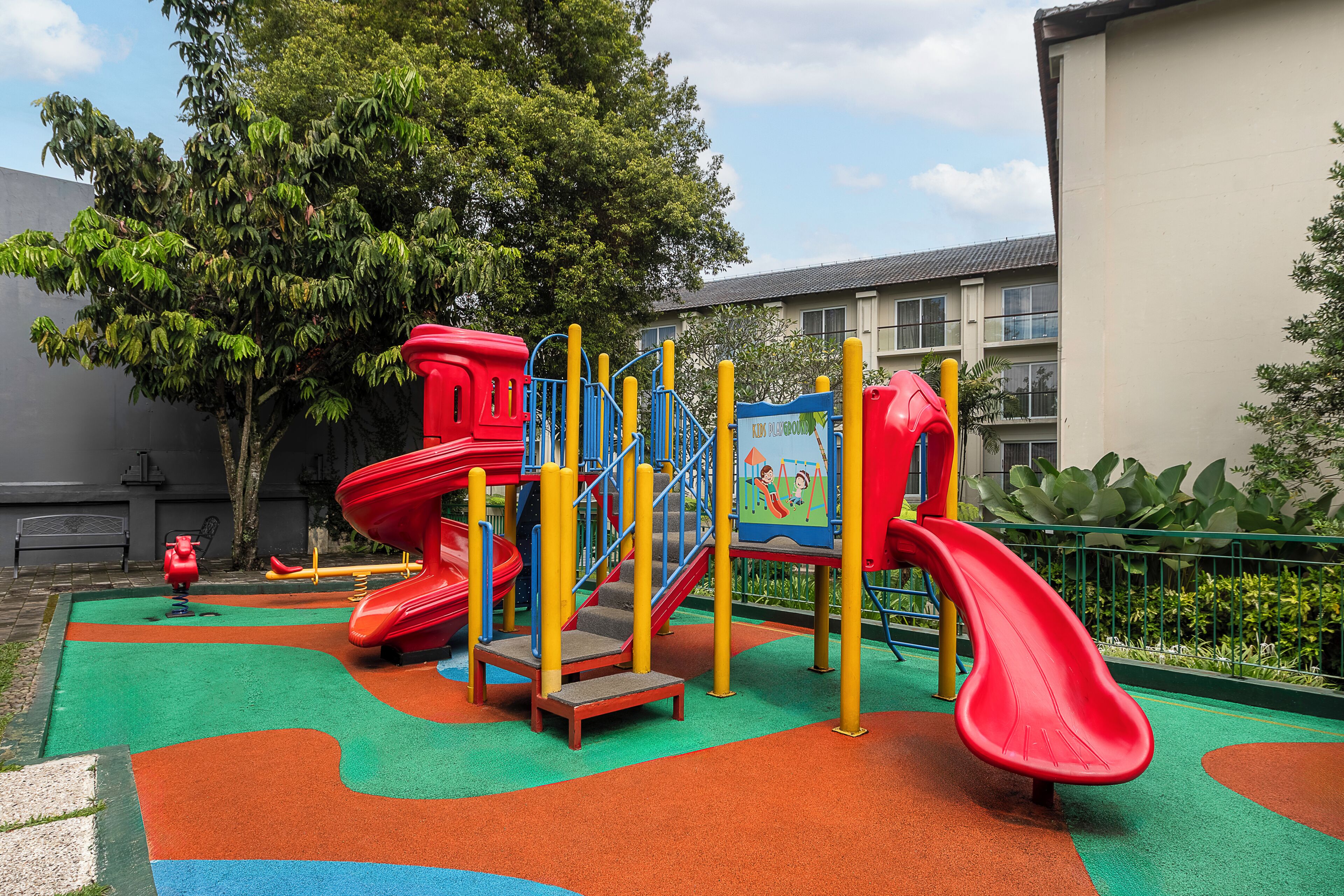 A playground with slides and climbing structures.