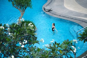 Outdoor pool, open 6:00 AM to 6:00 PM, free pool cabanas, pool umbrellas