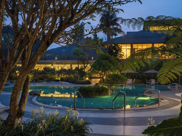 Outdoor pool, open 6:00 AM to 6:00 PM, free cabanas, pool umbrellas