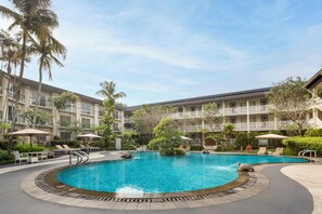 Outdoor pool, open 6:00 AM to 6:00 PM, free cabanas, pool umbrellas