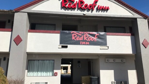 A Red Roof Inn building with a prominent signage, a flat roof, and a simple facade. - Red Roof Inn Somerset, PA (Somerset)