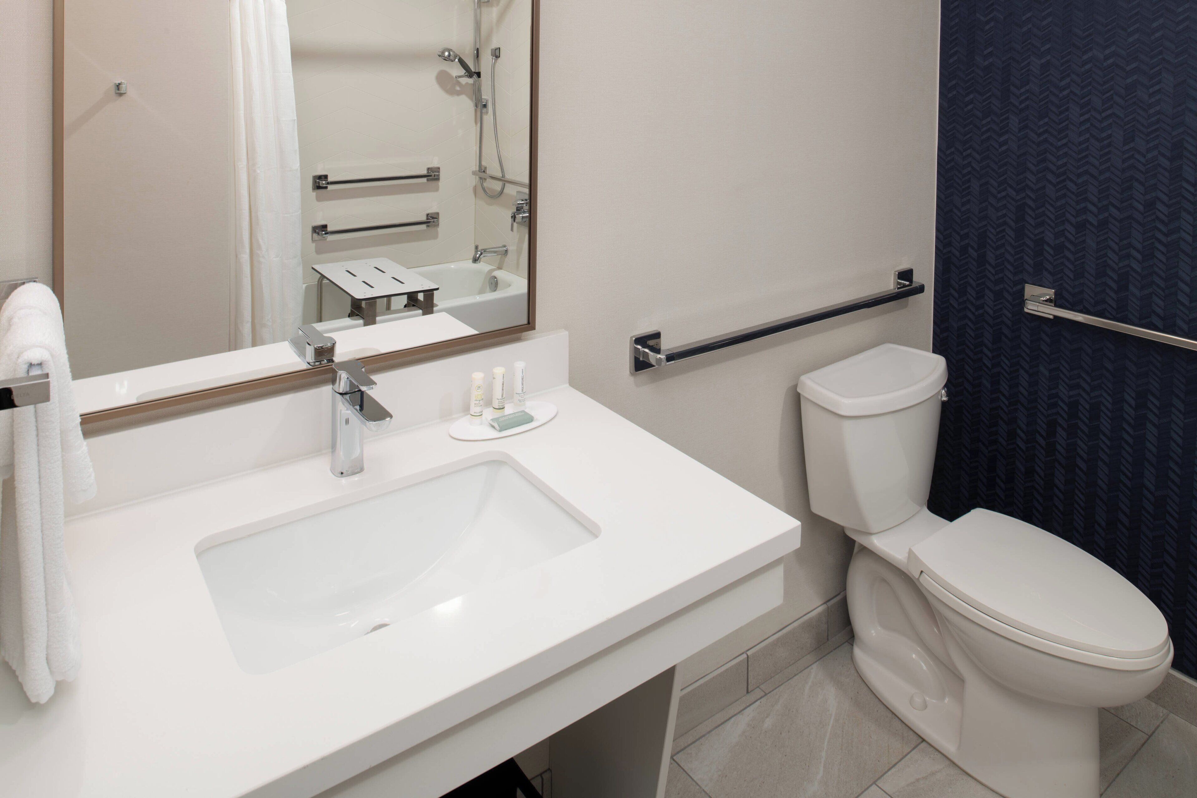 combined shower/bathtub, free toiletries, hair dryer, towels