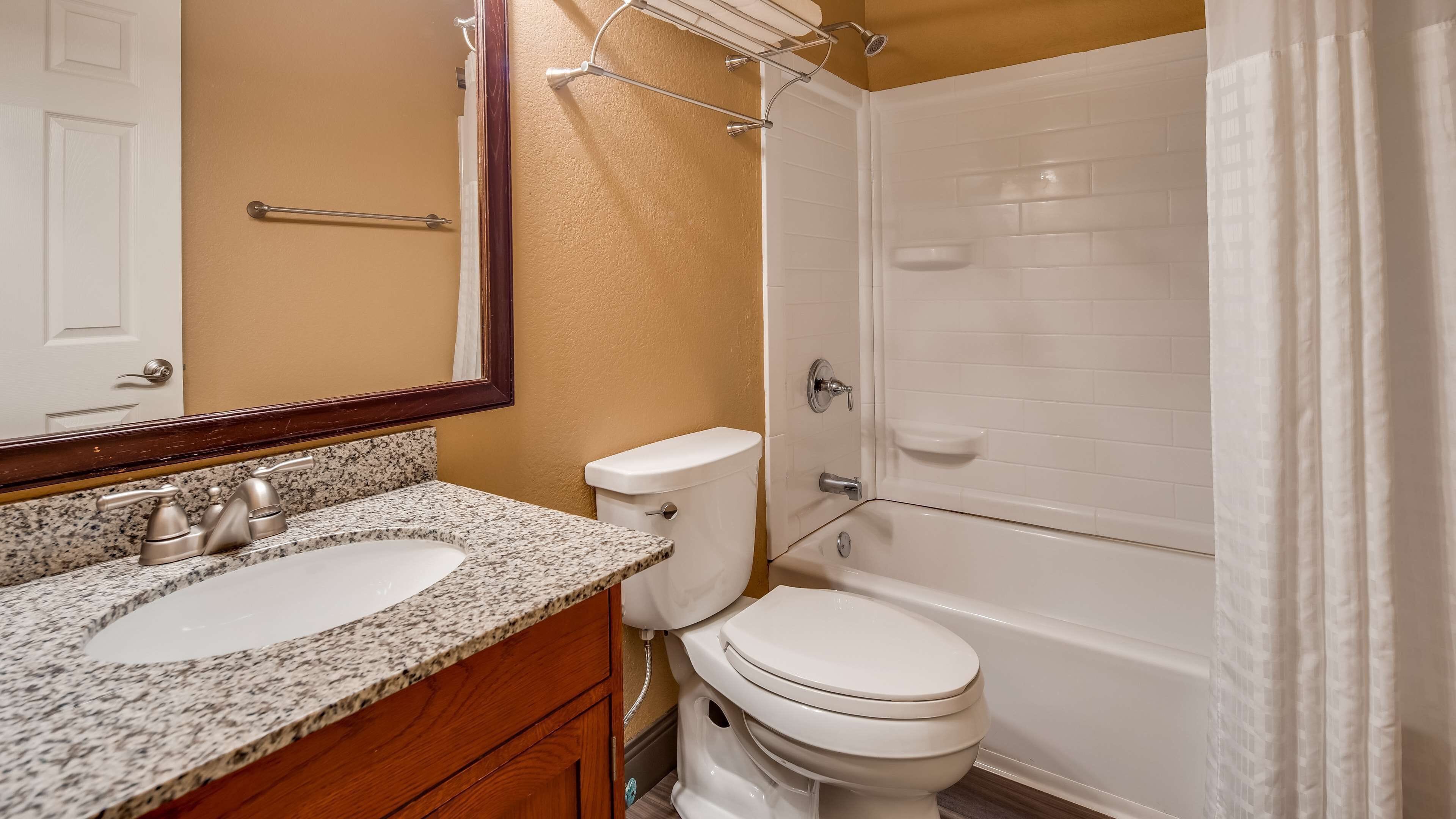 suite, 1 queen bed, non smoking, refrigerator & microwave (with sofabed) | bathroom | combined shower/bathtub, free toiletries, hair dryer, towels