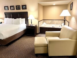 标准房, 1 张特大床, 无烟房, 按摩浴缸 | 高档床上用品、办公桌、笔记本电脑工作区、遮光窗帘