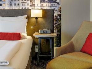 Hypoallergeen beddengoed, een gratis minibar, een kluis op de kamer