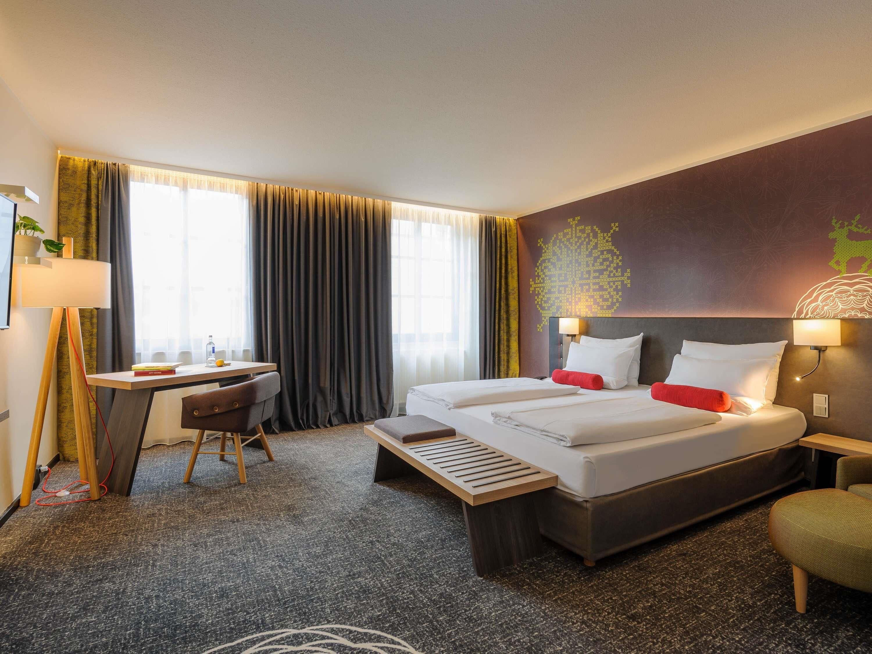 Hypo-allergenic bedding, free minibar, in-room safe, desk